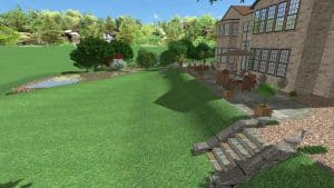 Brick house with outdoor patio and dining set on a stone terrace, overlooking a sloped green lawn and a pond with a wooden raft nearby.