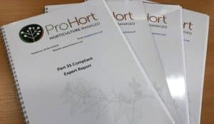 Part 35-compliant Expert Witness Report document displayed on a desk, representing formal expert evidence for legal proceedings.