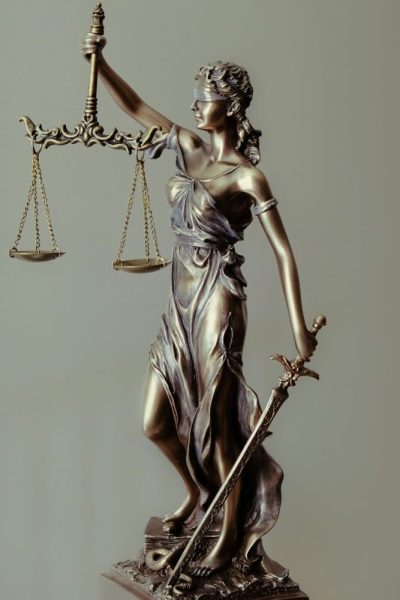Lady Justice indicating the need for justice in a P35 Witness report