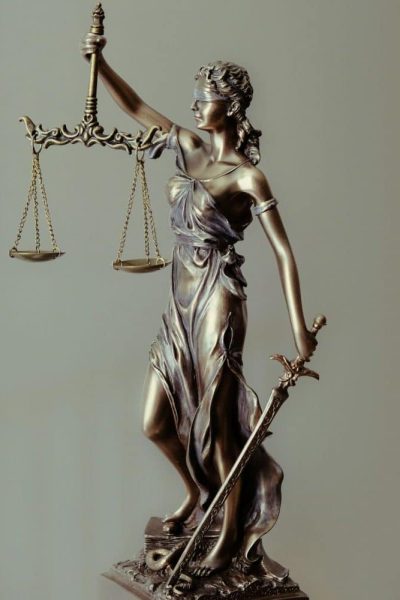Lady Justice indicating the need for justice in a P35 Witness report